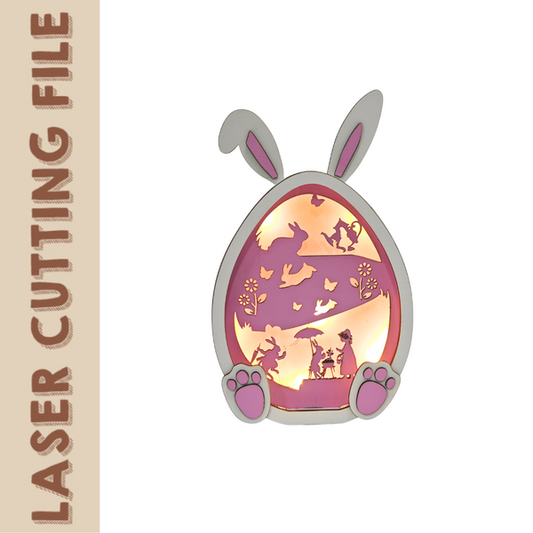 Easter bunny egg-shaped lightbox SVG design with layered silhouette cutouts for laser cutting. Soft glowing effect ideal for spring decor or night lights.