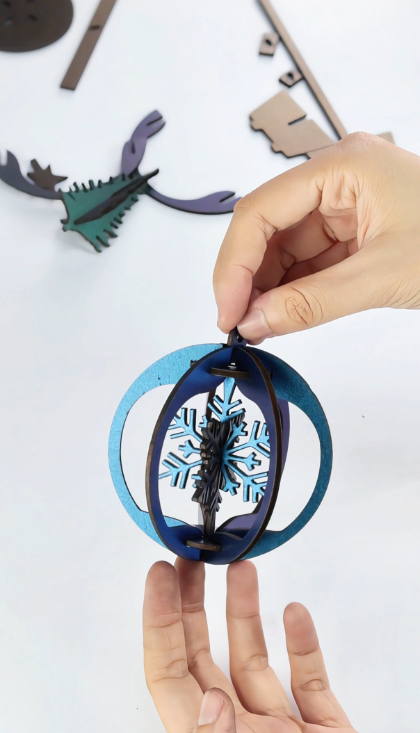 DIY crafts made with iridescent color-shift plywood – laser cut keychains and ornaments